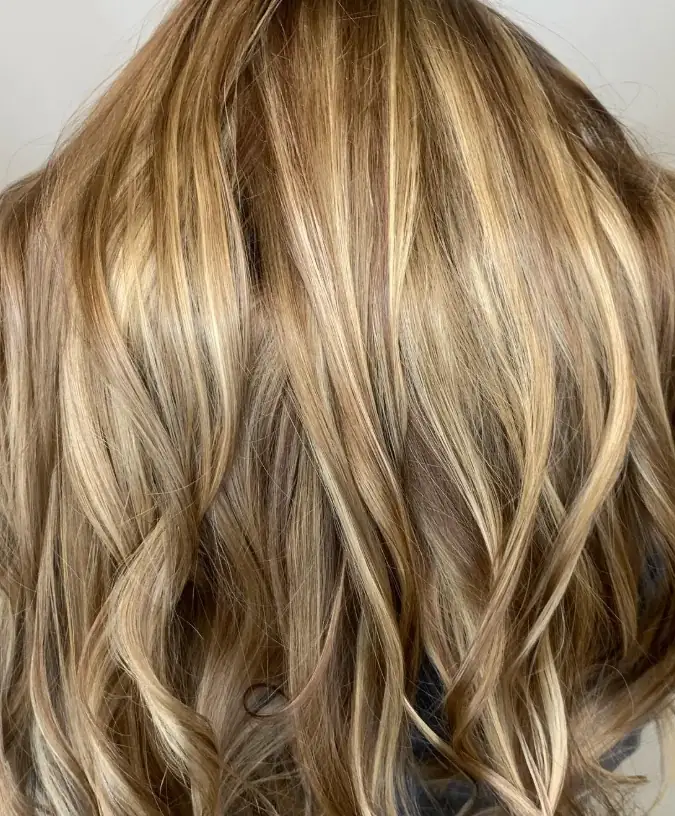 Dimensional blonde highlights and lowlights by Gypsy Cosmo Salon
